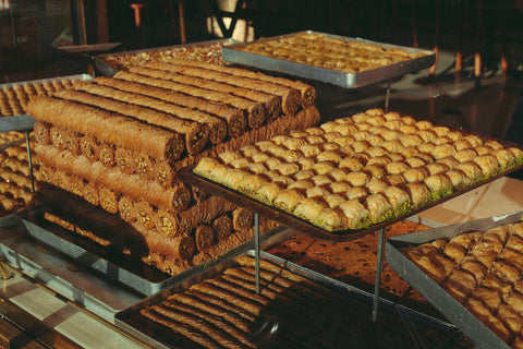 Various kinds of traditional baklava pastries in the window of a bakery in Istanbul