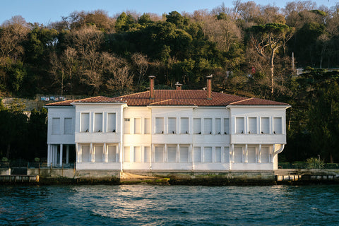 A mansion on the banks of the Bosphorus Strait t in Istanbul at sunset
