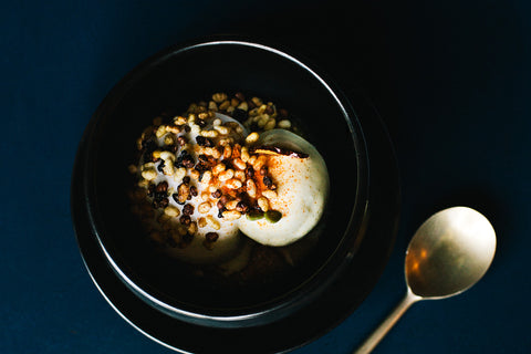 Doenjang crème brûlée, Ganjang pecan, Gochujang black rice, with vanilla ice cream and whiskey foam at Mingles restaurant in Seoul, South Korea
