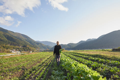 Chef Yoshihiro Imai harvesting fresh vegetables for his pizza restaurant in Kyoto, Japan