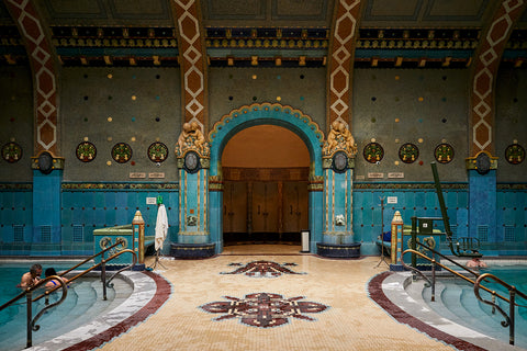 The interior of a traditional tiled bathhouse at Gellért Baths in Budapest, Hungary