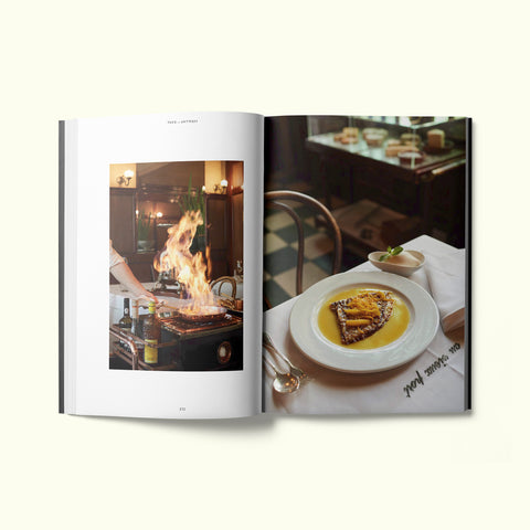 An interior spread of Fare magazine's Antwerp, Belgium city guide, featuring photographs by Liz Seabrook of French bistro Au Vieux Port