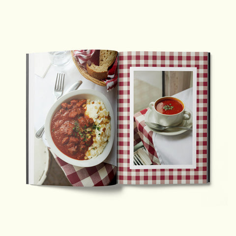 An interior spread of Fare magazine's Budapest, Hungary city guide, featuring a photograph by Sam A. Harris of the goulash and soup at Róma Ételbár restaurant