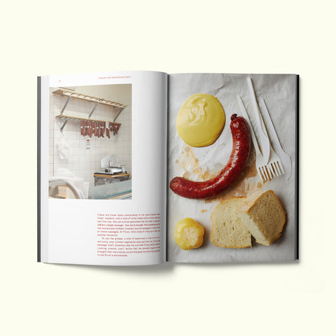 An interior spread of Fare magazine's Budapest, Hungary city guide, featuring photographs by Sam A. Harris of Pinczi Hús-Hentesáru Bolt butcher shop