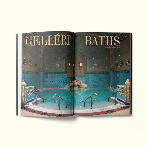 An interior spread of Fare magazine's Budapest, Hungary city guide, featuring a photograph by Sam A. Harris of the Gellért Baths