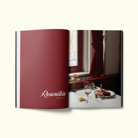 An interior spread of Fare magazine's Budapest, Hungary city guide, featuring a photograph by Sam A. Harris of a roasted duck leg at Rosenstein's restaurant