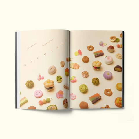 An interior spread of Fare magazine's Kyoto, Japan city guide, featuring a photograph of all different shapes of Kyogashi