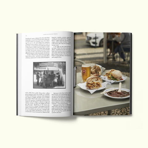 An interior spread of Fare magazine's Lisbon, Portugal city guide, featuring an archival photograph of a quiosque from the early twentieth century and a photograph of a table of sandwiches from Quiosque de São Paulo