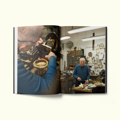 An interior spread of Fare magazine's Naples, Italy city guide, featuring photographs by Sam A. Harris of a metalworker in his workshop