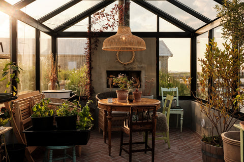 A cosy nordic greenhouse interior in Herøy, North Norway