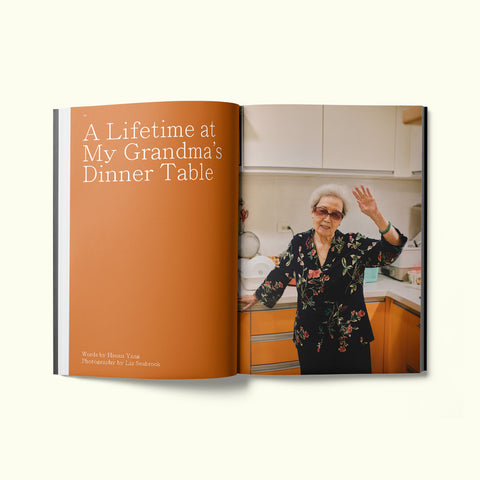 An interior spread of Fare magazine's city guide to Taipei, featuring a photograph of a Taiwanese grandmother in her kitchen, with text by Hsuan Yang