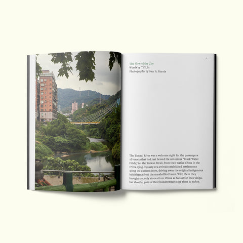An interior spread of Fare magazine's city guide to Taipei, featuring a photograph by Sam A. Harris of the Tamsui River, with text by TC Lin