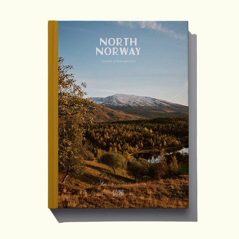 The cover of Fare's book North Norway: Seasons of Sun and Sno, featuring a photograph by Liz Seabrook of an autumnal mountain landscape