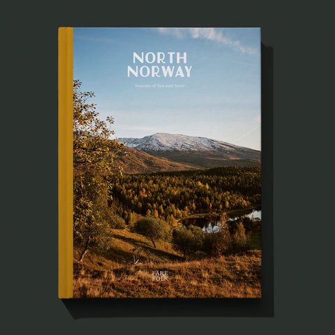 The cover of Fare's book North Norway: Seasons of Sun and Snow featuring a photograph by Liz Seabrook of an autumnal mountain landscape in Helgeland