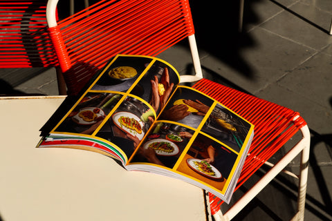 One city. 200 pages. Twice a year.